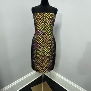 Bebe strapless dress with chain the detailing in the back